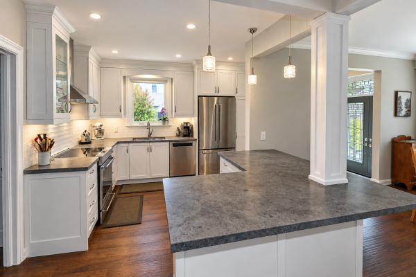 Bright Transitional Kitchen with Dark Stone Peninsula - Etobicoke - Toronto