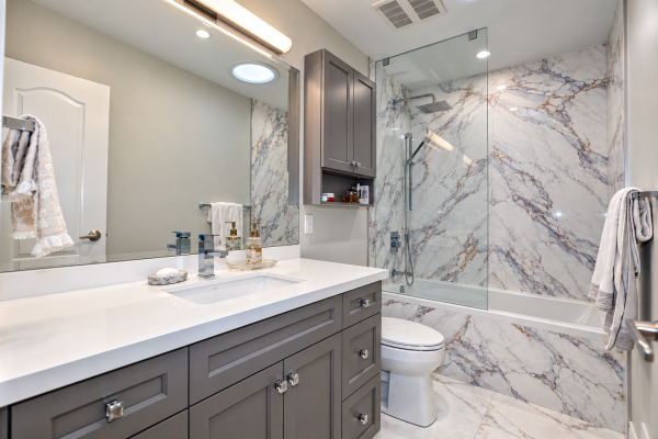 Luxury bathroom with booked matched slabs - North York - Toronto